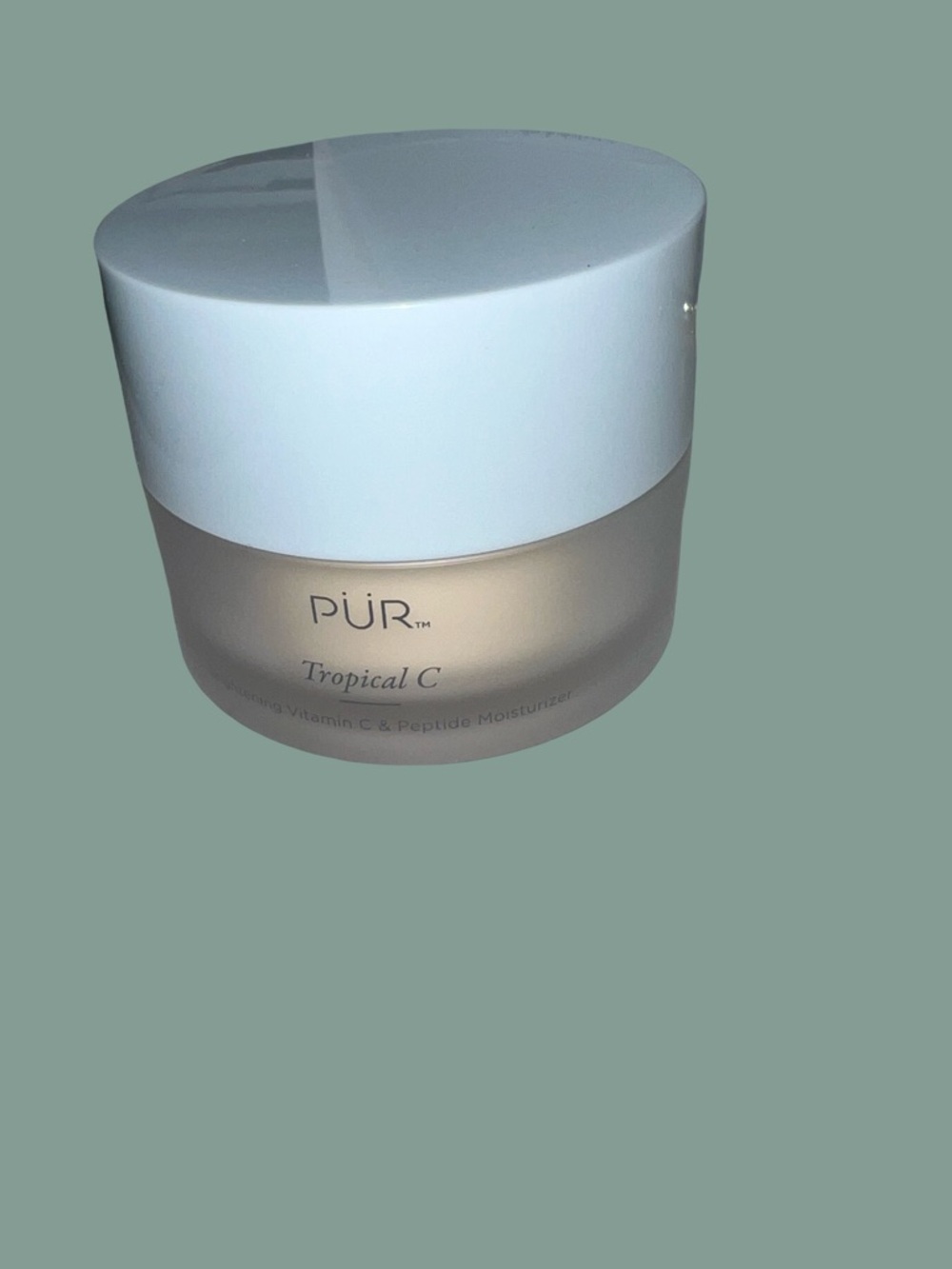 Pur Tropical C Moisturizer White and Beige Jar